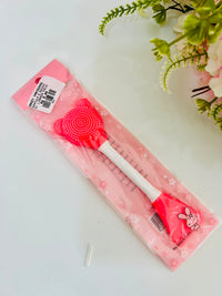 Espatula e escova para limpeza facial