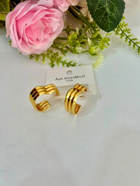 brinco dourado aço
