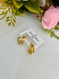 brinco dourado aço