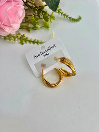 brinco dourado aço